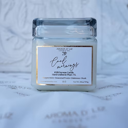 Aroma D'Liz signature candle on marble